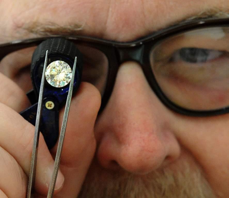 Jeweler Examining a Diamond